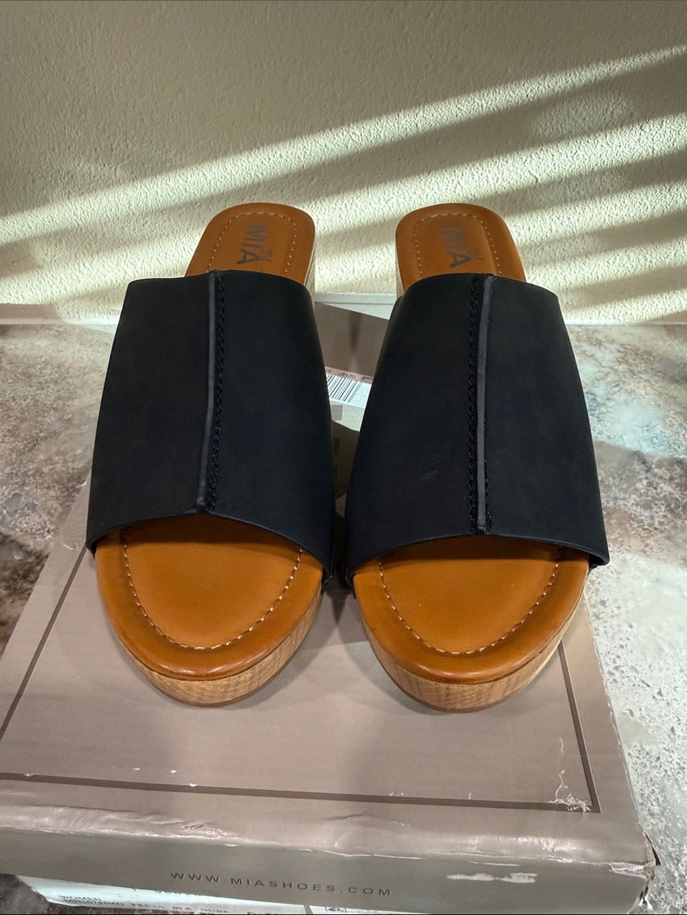 MIA Black Slide Mules with Tan Footbed and Wood-Effect Platform